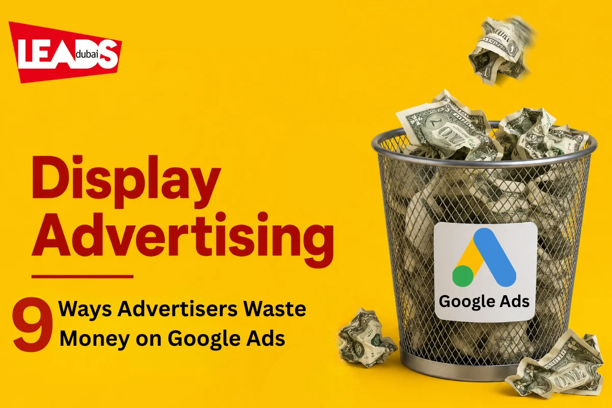 Banner reading display advertising, top 9 ways advertisers waste money on Adwords, with ad icons on a desktop and phone